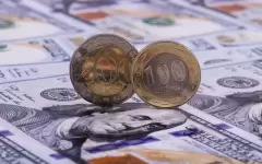 В марте курс тенге ослаб на 1%