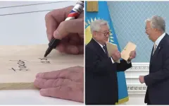 По традициям таеквондо: Токаев расписался на тренировочной доске, а затем разбил ее