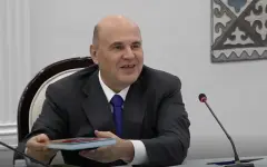 Премьер РФ принес на встречу с президентом Кыргызстана учебники русского языка