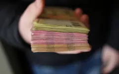 Названо количество казахстанцев с кредитными долгами