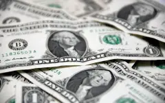 Доллар слегка вырос на торгах